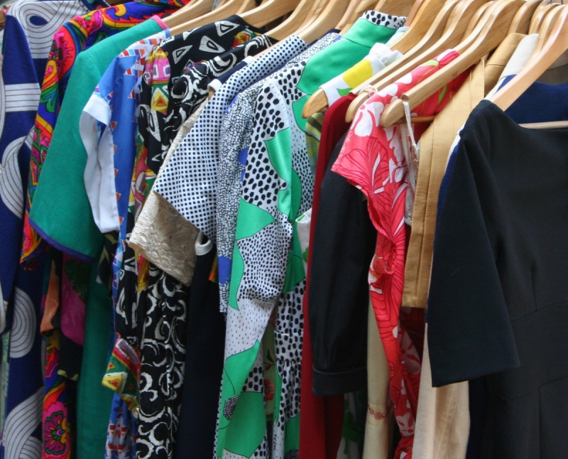 association-LA BRIGUE-min_dresses_apparel_clothing_clothes_clothes_hangers_wooden_hangers_retail_shop_closet-1149845